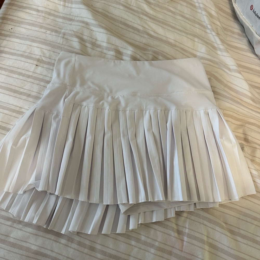Gold hinge white skirt
